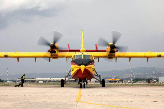 A Canadair CL-415 amphibious aircraft prepares for take off on an emergency firefighting mission at the Hellenic Air Force's 113 Combat Wing air base in Thessaloniki, Greece. Image: Konstantinos Tsakalidis/Bloomberg